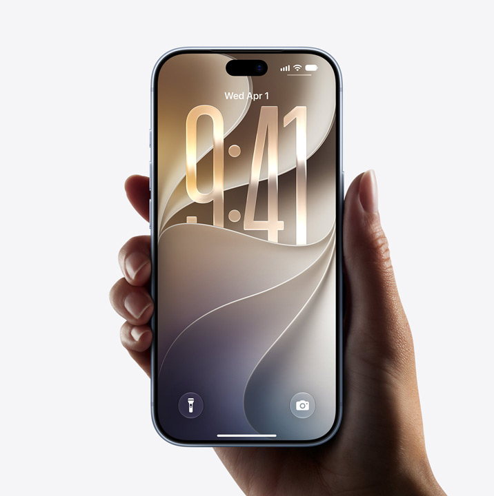 Hand holding iPhone 17 showing all-screen display, lock screen showing Liquid Glass border