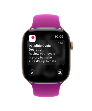 Apple Watch Series 12，淺金色鋁金屬錶殼，配搭洋紅色運動錶帶，螢幕顯示可能的經期異常通知